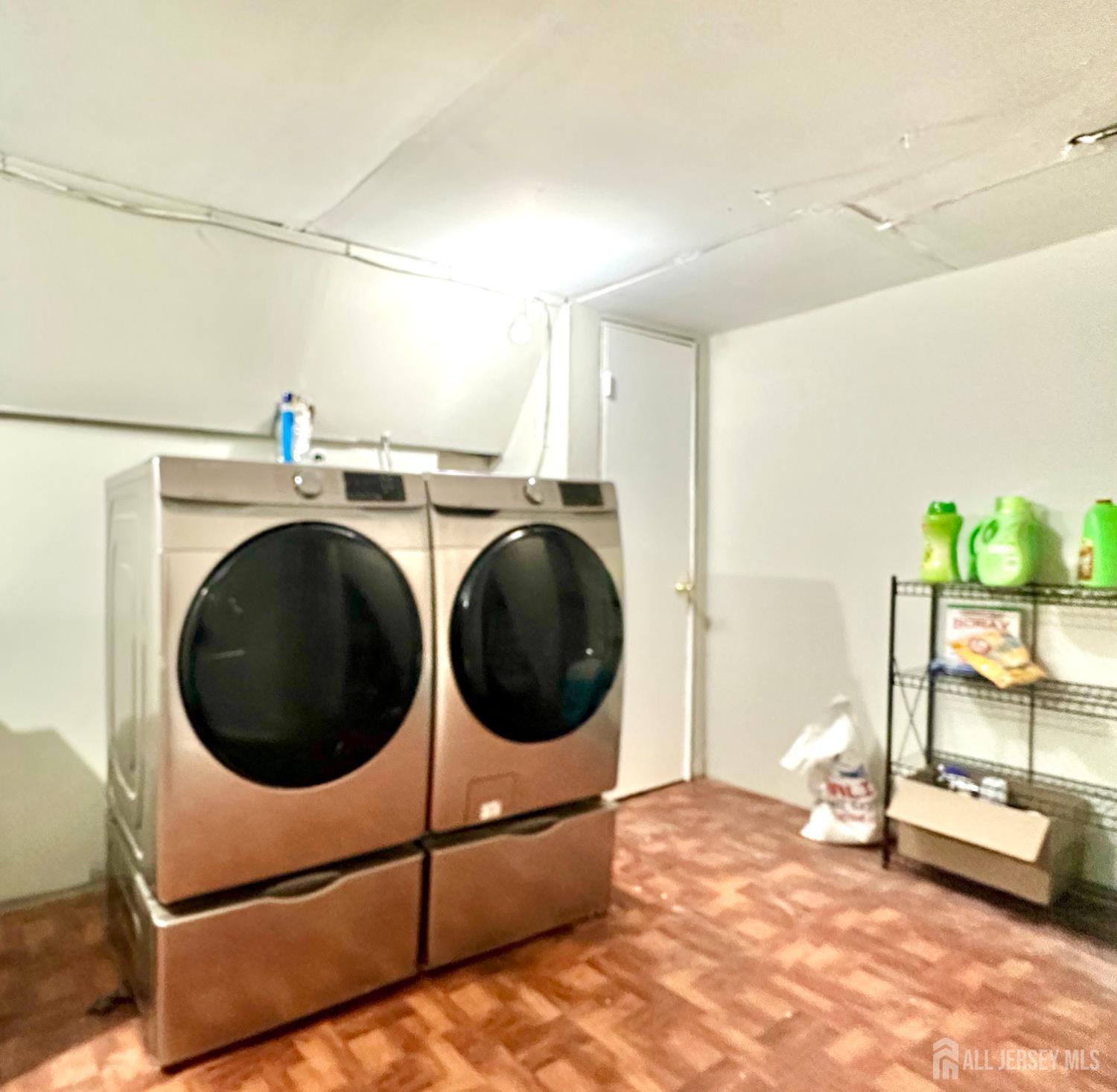 41 Brookview Circle Jamesburg, NJ 08831 - Photo 38 of 38 a view of a hallway with washer and dryer