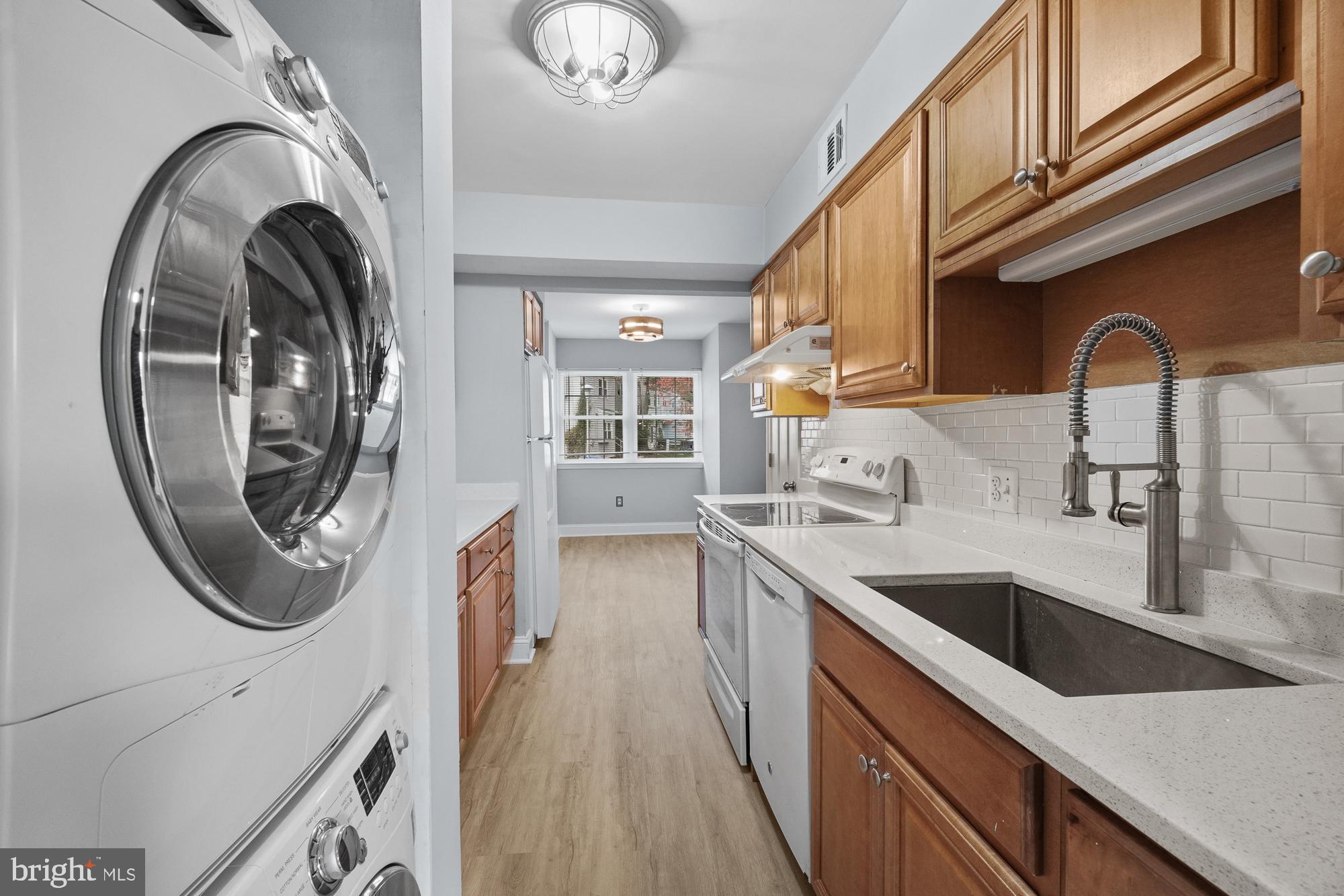 17433 Hoskinson Road Poolesville, MD 20837 - Photo 21 of 50 Main floor laundry