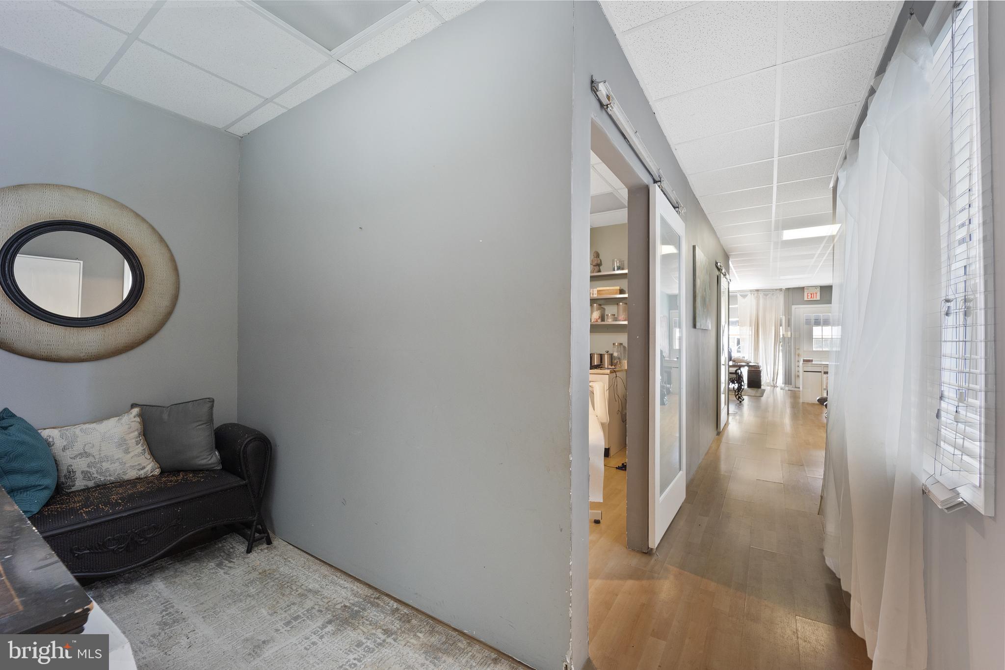 117 Haddon Avenue Haddon Township, NJ 08108 - Photo 11 of 30 a living room with furniture and a wooden floor