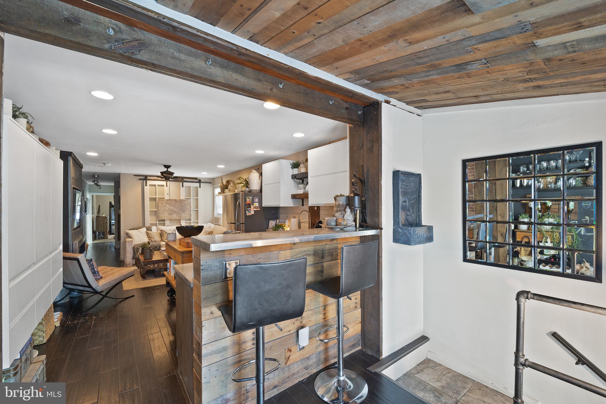 117 Haddon Avenue Haddon Township, NJ 08108 - Photo 16 of 30 a living room with stainless steel appliances furniture a rug and a large window