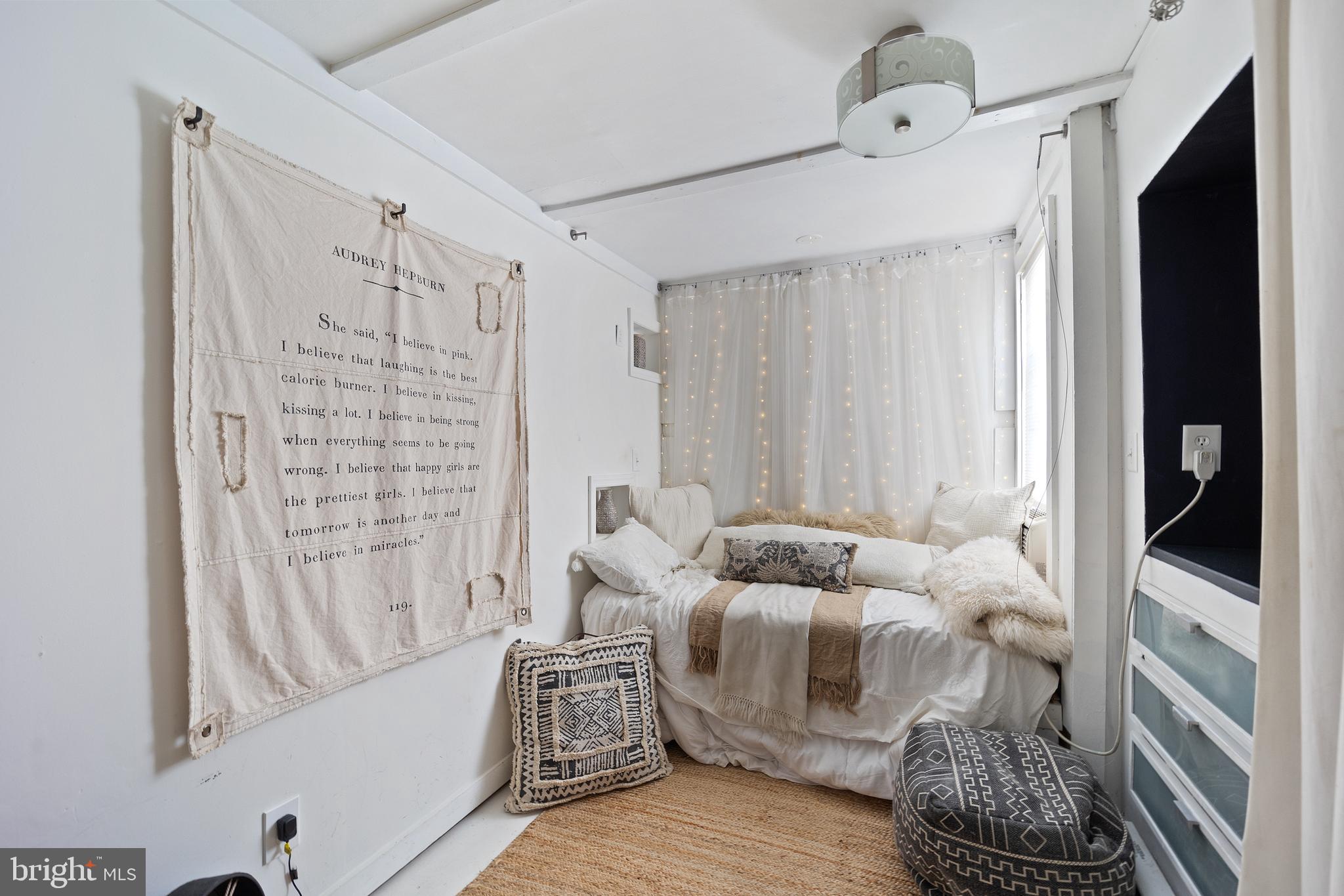 117 Haddon Avenue Haddon Township, NJ 08108 - Photo 23 of 30 a living room with furniture and a window