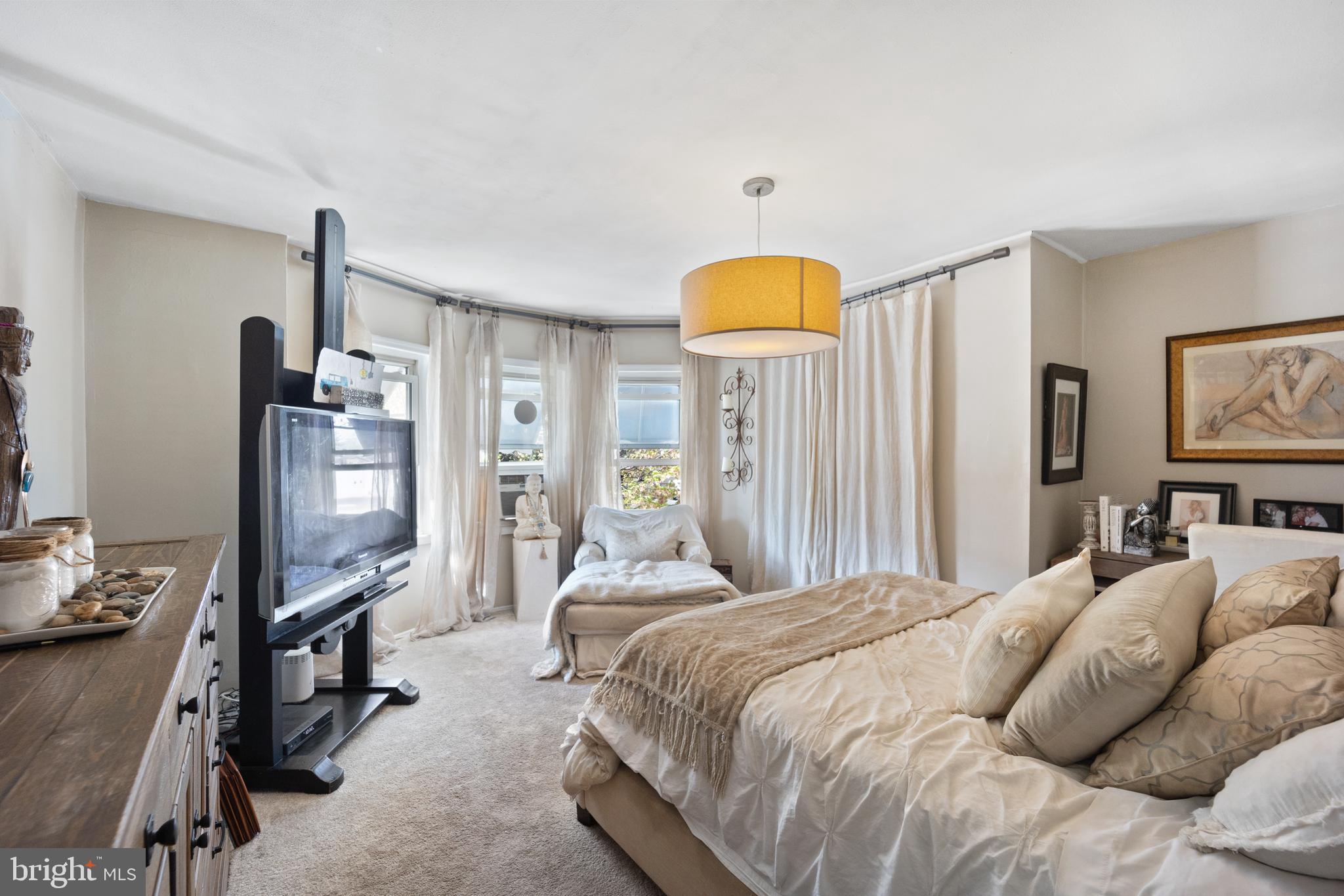 117 Haddon Avenue Haddon Township, NJ 08108 - Photo 26 of 30 a bedroom with a bed flat screen tv and dresser