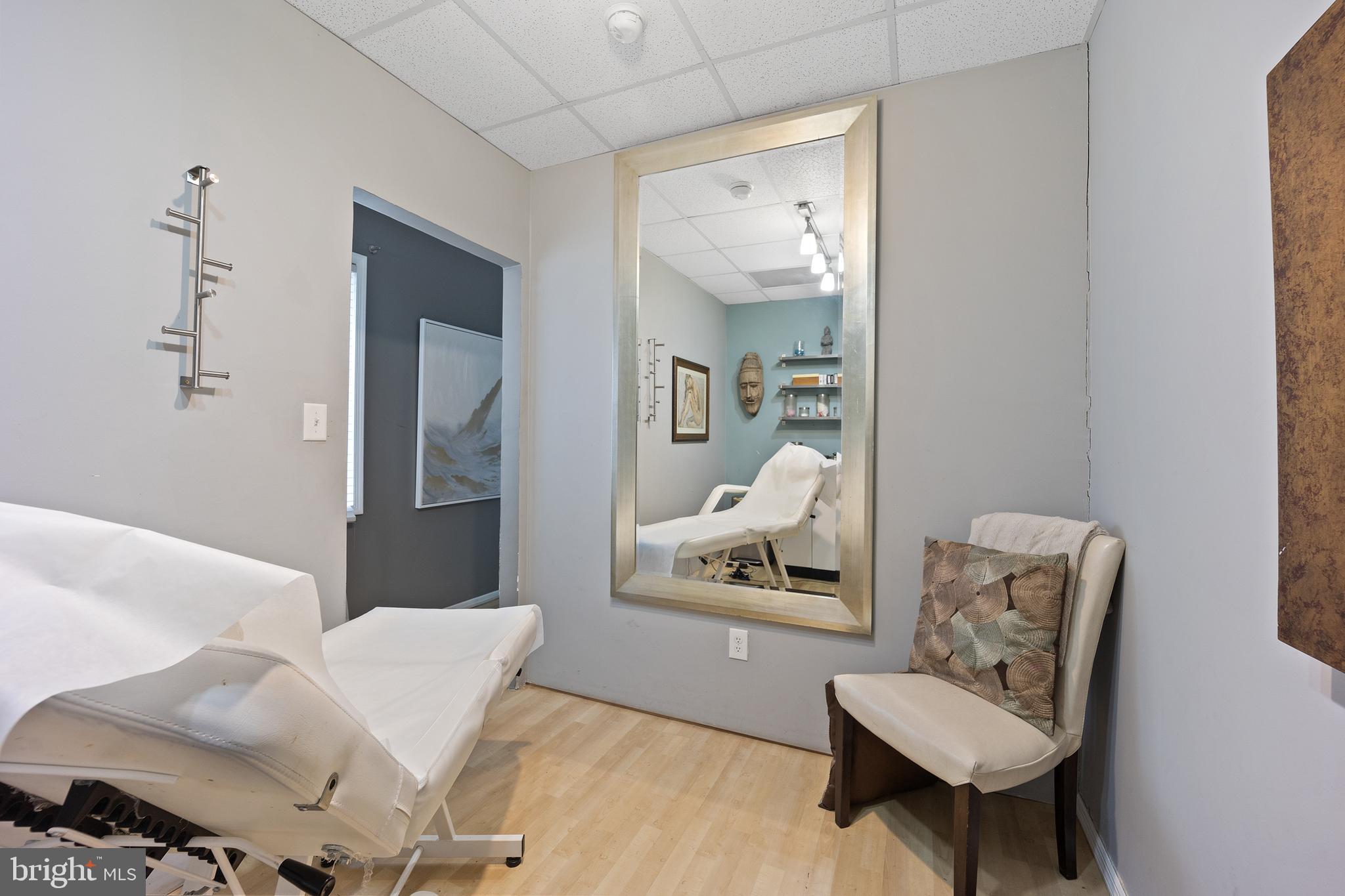 117 Haddon Avenue Haddon Township, NJ 08108 - Photo 9 of 30 a living room with furniture and a mirror