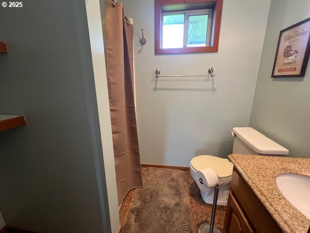 1627 Maple Street Myrtle Point, OR 97458 - Photo 18 of 23 a bathroom with a toilet