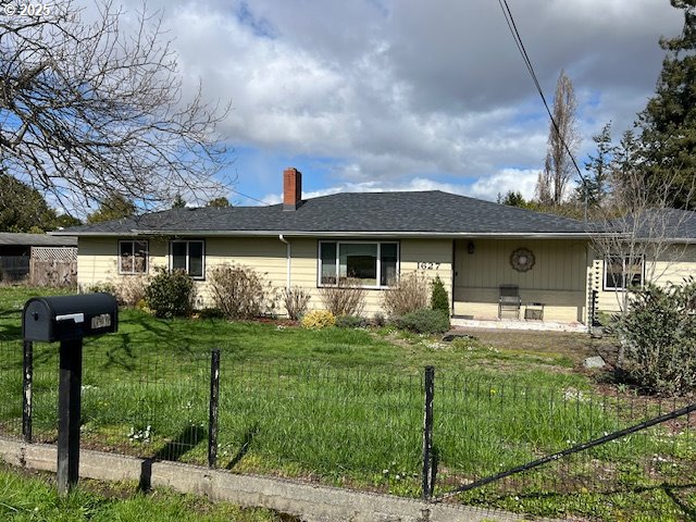 1627 Maple Street Myrtle Point, OR 97458 - Photo 19 of 23 a front view of a house with garden