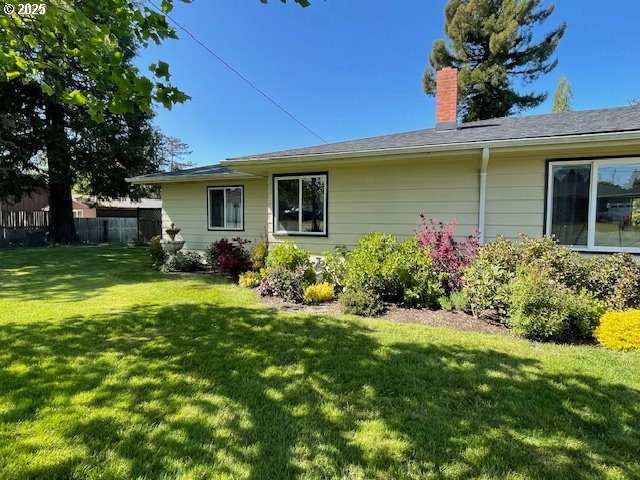 1627 Maple Street Myrtle Point, OR 97458 - Photo 20 of 23 a front view of a house with garden