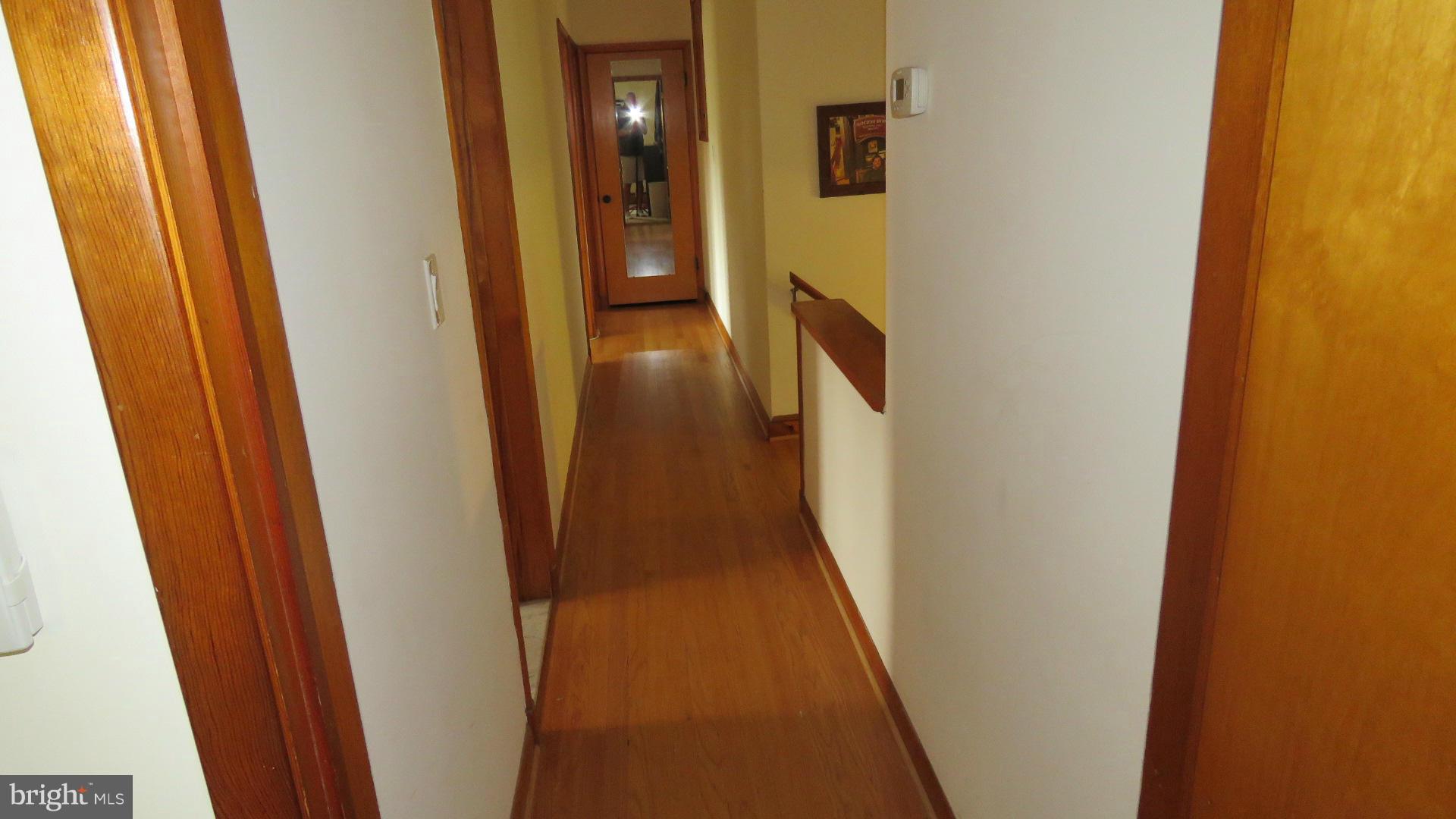 9813 Hawkins Creamery Road Damascus, MD 20872 - Photo 16 of 21 a view of a hallway with a door
