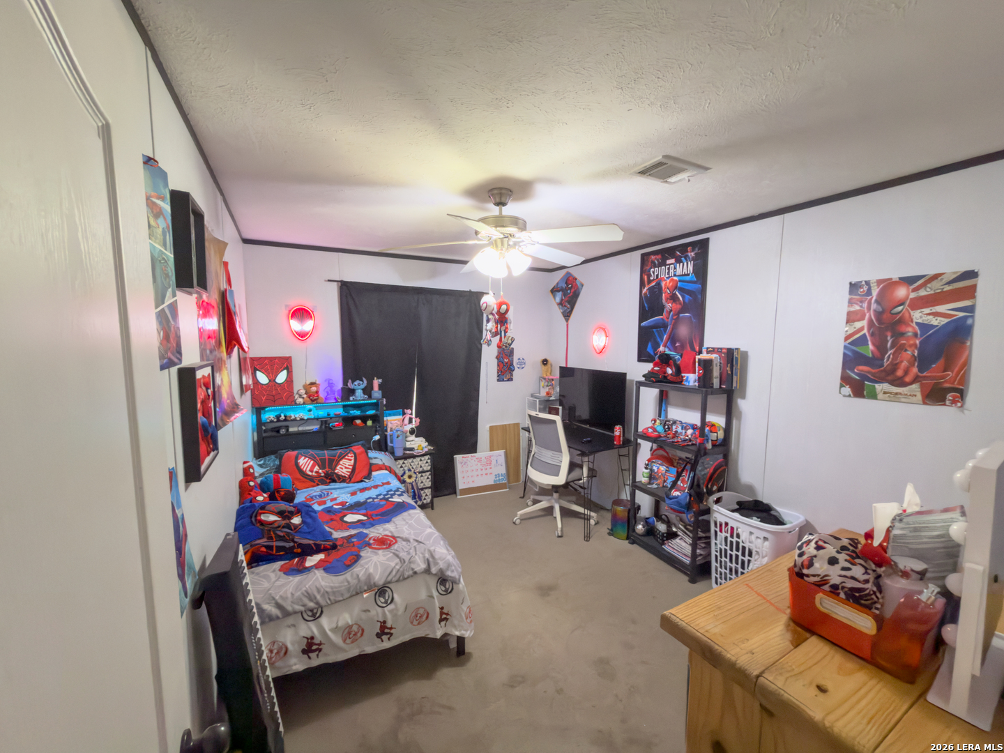 114 4th Street Natalia, TX 78059 - Photo 25 of 32 a bedroom with furniture and a bed