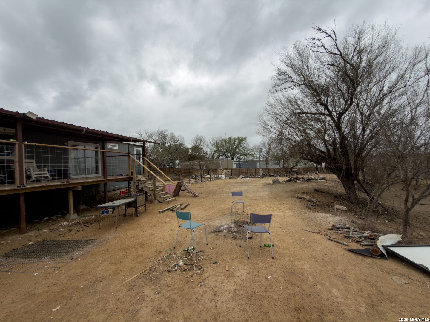114 4th Street Natalia, TX 78059 - Photo 30 of 32 a view of a house with a yard