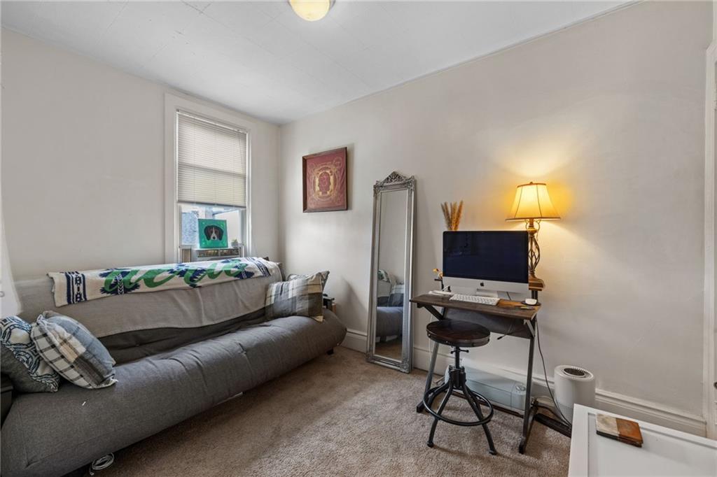 5211 Kent Way Pittsburgh, PA 15201 - Photo 13 of 18 a living room with furniture and a flat screen tv