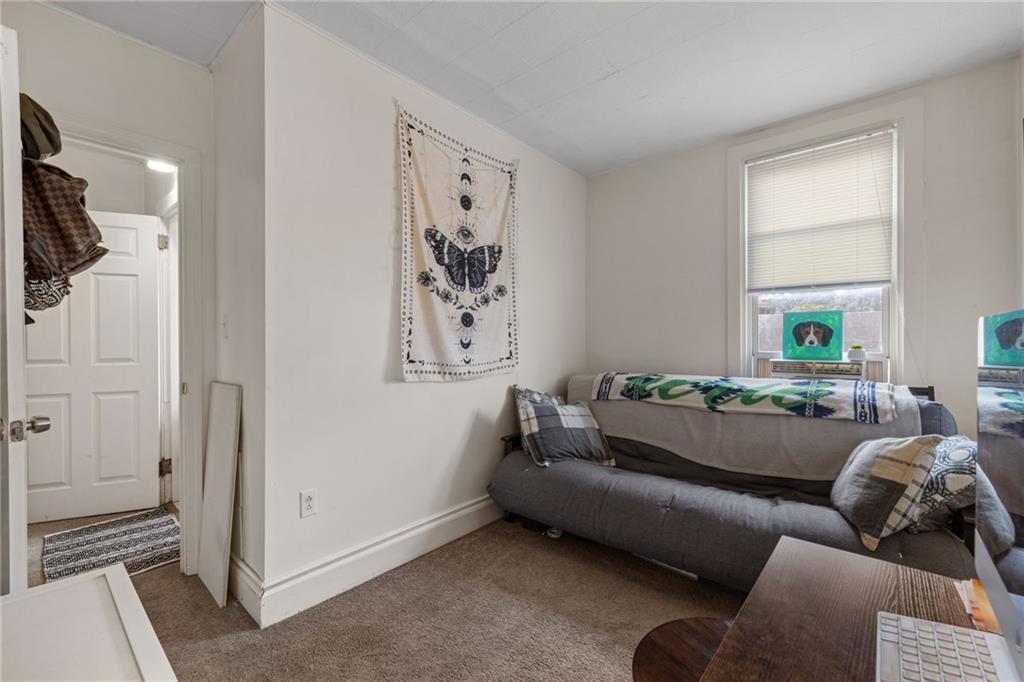 5211 Kent Way Pittsburgh, PA 15201 - Photo 14 of 18 a living room with furniture and a flat screen tv