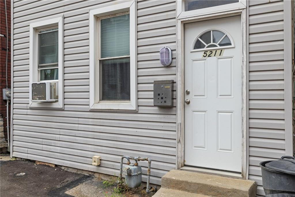 5211 Kent Way Pittsburgh, PA 15201 - Photo 2 of 18 a view of a house with a door and a window