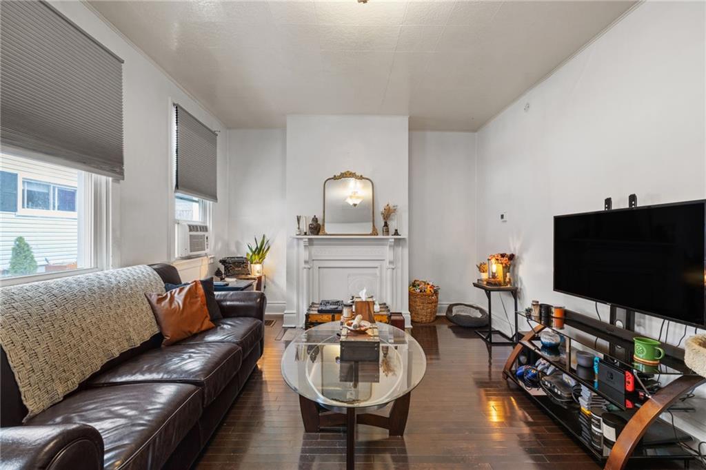 5211 Kent Way Pittsburgh, PA 15201 - Photo 5 of 18 a living room with furniture and a flat screen tv