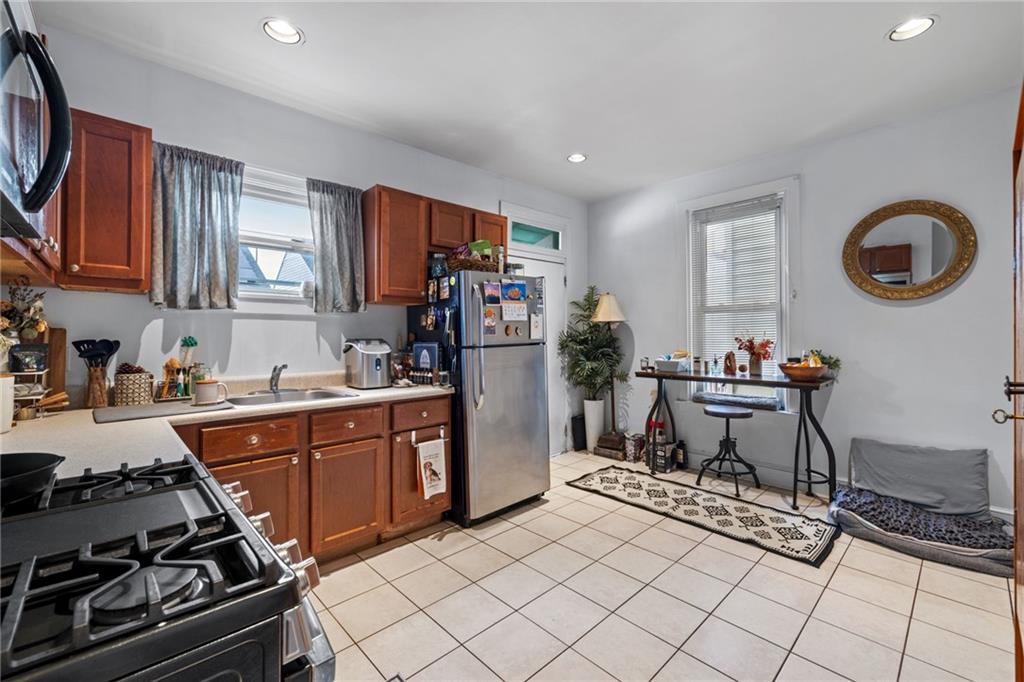 5211 Kent Way Pittsburgh, PA 15201 - Photo 8 of 18 a kitchen with refrigerator and cabinets