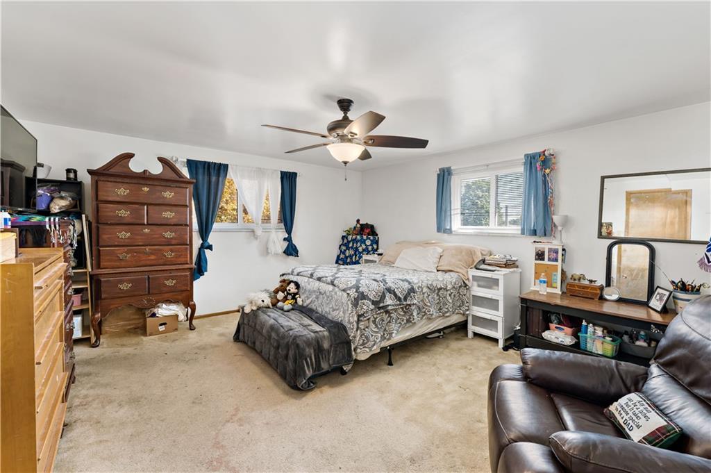 38 May Avenue McKees Rocks, PA 15136 - Photo 16 of 38 a bed room with bed and a night stand