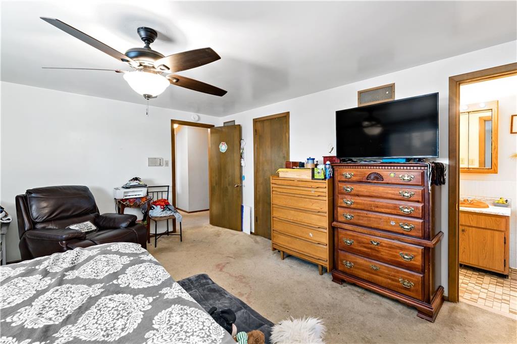 38 May Avenue McKees Rocks, PA 15136 - Photo 17 of 38 a bedroom with furniture and a flat screen tv