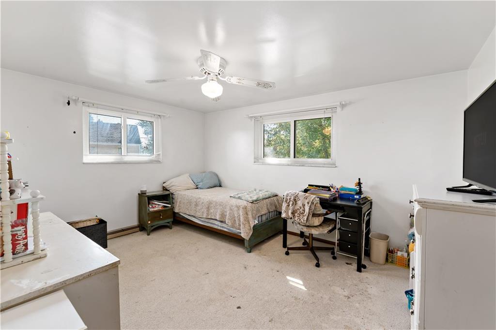 38 May Avenue McKees Rocks, PA 15136 - Photo 19 of 38 a bedroom with furniture and a window
