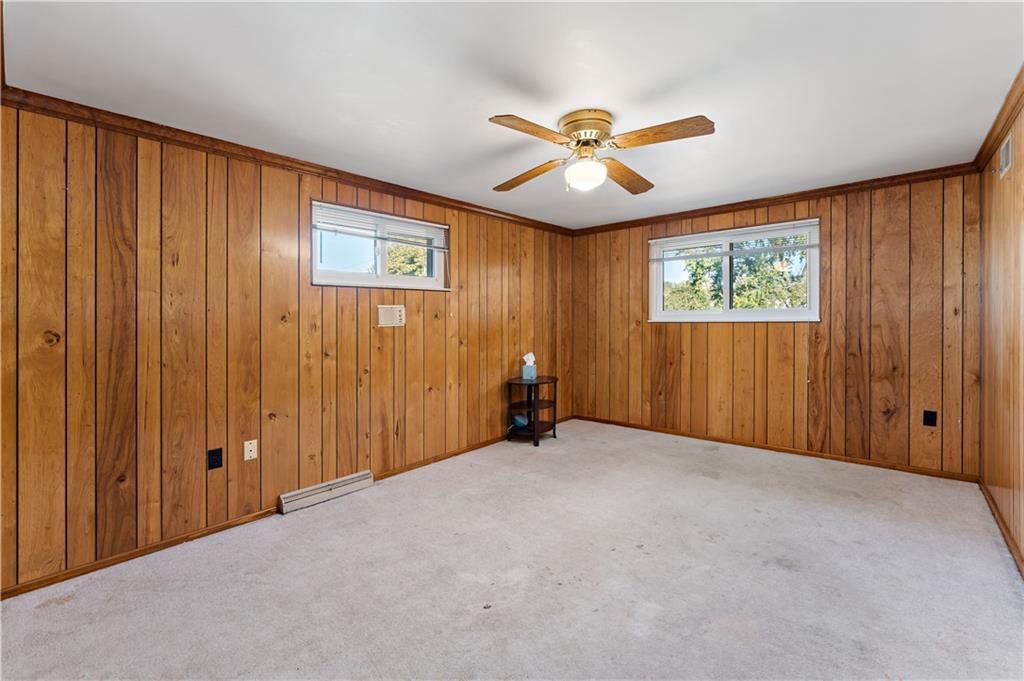 38 May Avenue McKees Rocks, PA 15136 - Photo 22 of 38 a view of a livingroom with a chandelier fan and a window