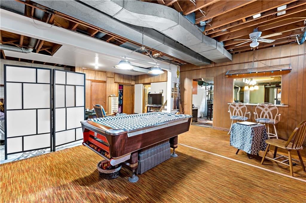 38 May Avenue McKees Rocks, PA 15136 - Photo 25 of 38 a living room with a table chairs and a table