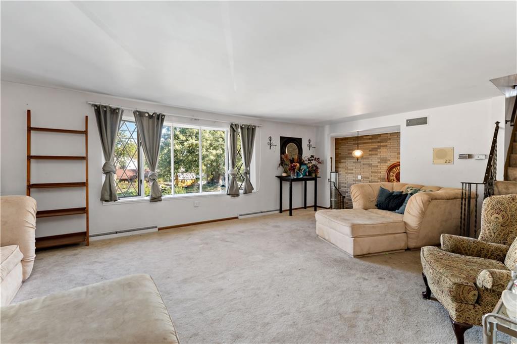 38 May Avenue McKees Rocks, PA 15136 - Photo 3 of 38 a living room with furniture and a large window