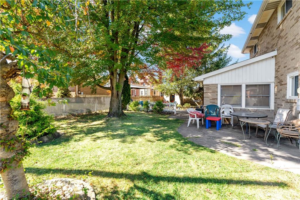 38 May Avenue McKees Rocks, PA 15136 - Photo 33 of 38 a view of a house with backyard porch and sitting area