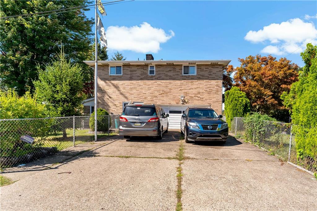 38 May Avenue McKees Rocks, PA 15136 - Photo 34 of 38 a car parked in front of a house