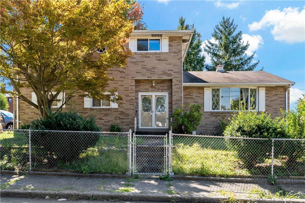 38 May Avenue McKees Rocks, PA 15136 - Photo 38 of 38 a front view of a house with a yard