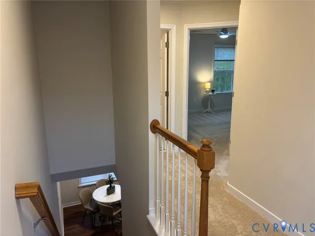 a view of a bathroom from the hallway
