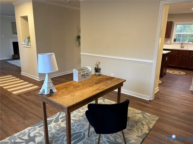 a balcony view with a table and chairs