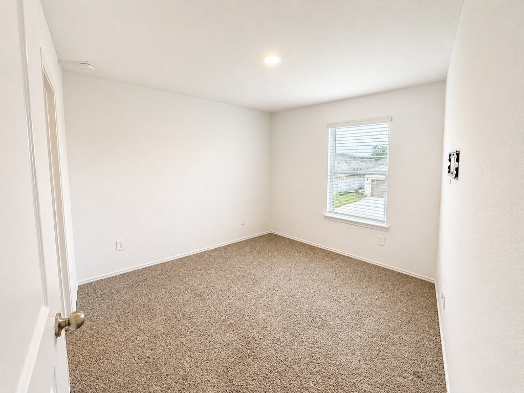 5218 Mossdale Blf Lane Spring, TX 77373 - Photo 14 of 14 an empty room with windows