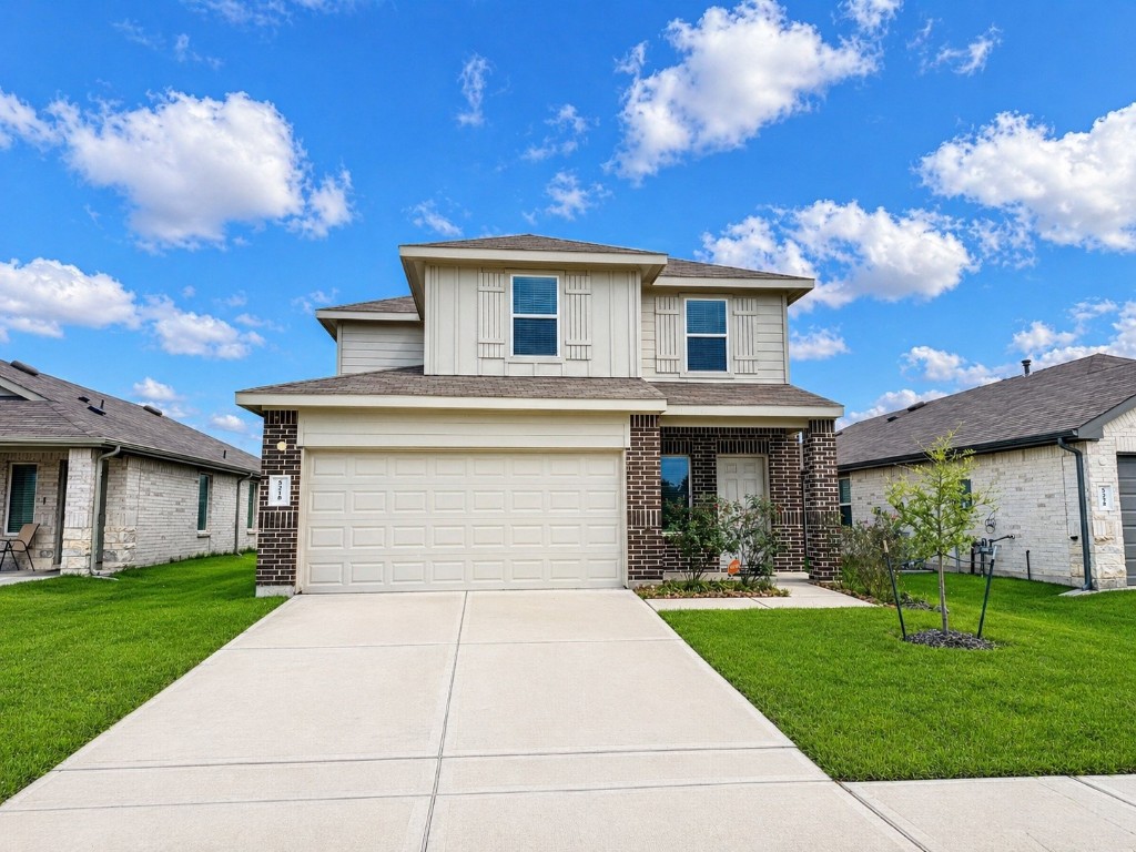 5218 Mossdale Blf Lane Spring, TX 77373 - Photo 3 of 14 a front view of house with a garden