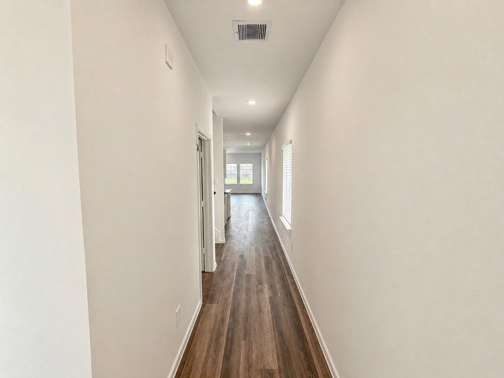 5218 Mossdale Blf Lane Spring, TX 77373 - Photo 4 of 14 a view of hallway with wooden floor