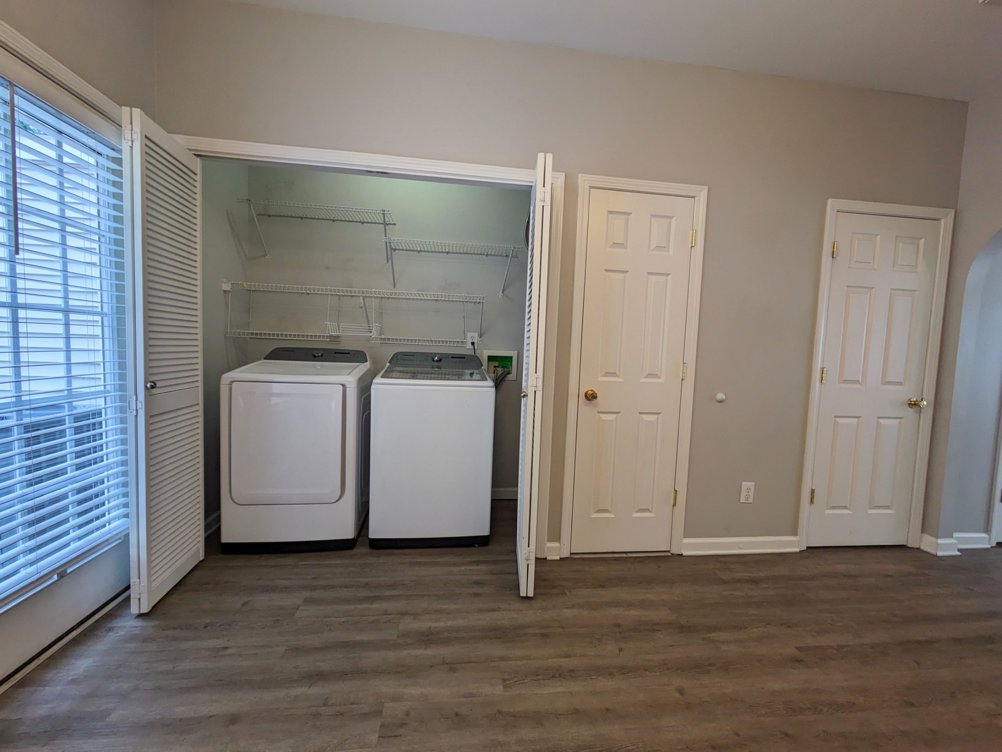 1101 Downs Boulevard, Unit B105 Franklin, TN 37064 - Photo 17 of 44 a view of a utility room with washer and dryer