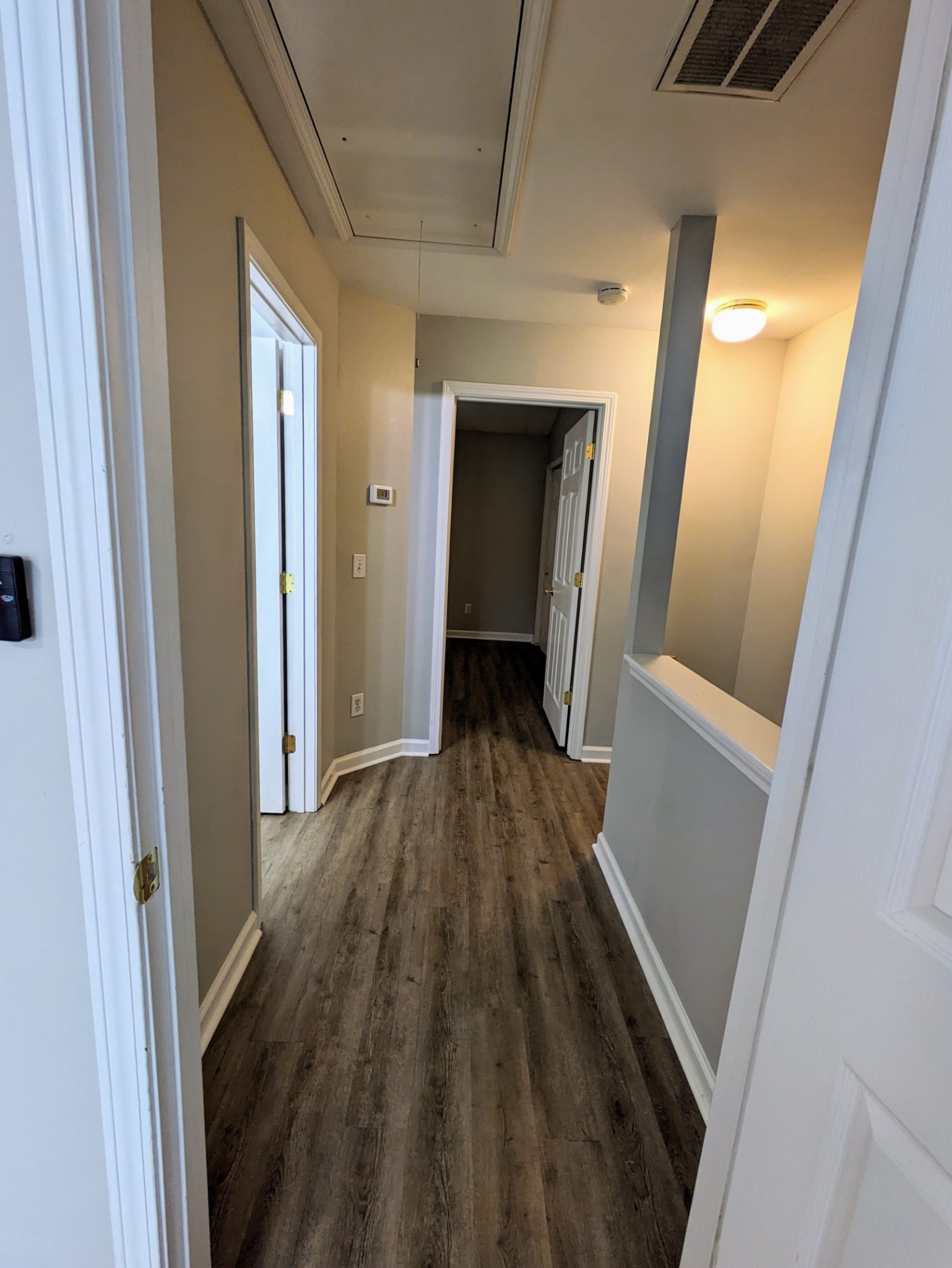 1101 Downs Boulevard, Unit B105 Franklin, TN 37064 - Photo 36 of 44 a view of hallway with wooden floor