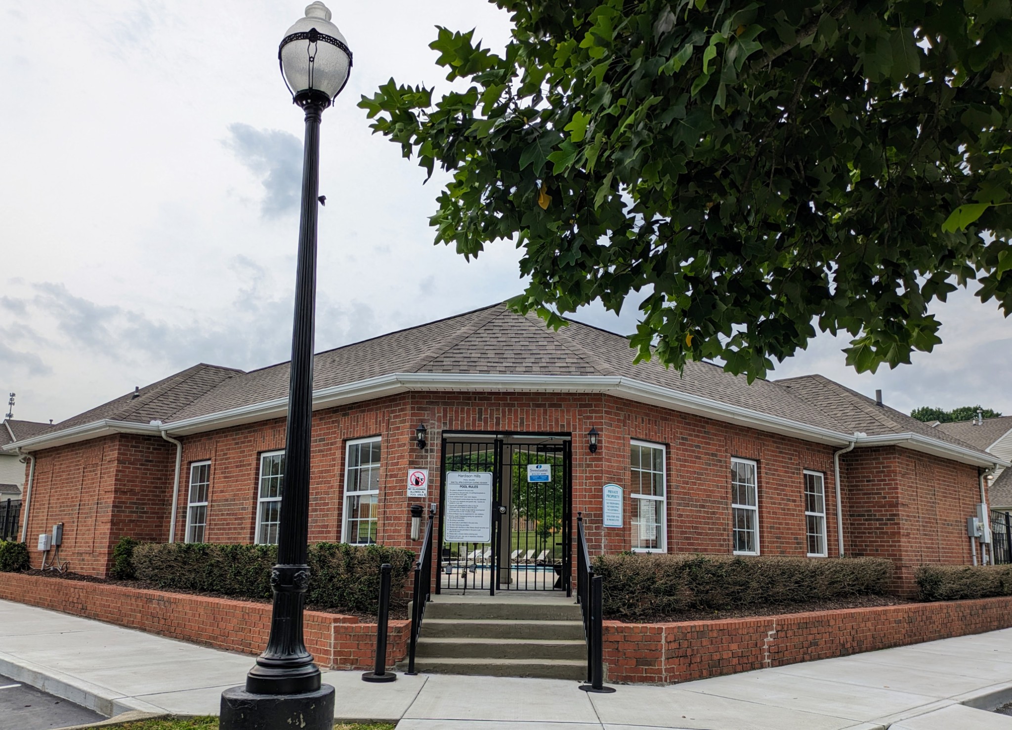 1101 Downs Boulevard, Unit B105 Franklin, TN 37064 - Photo 42 of 44 a front view of a house with a porch