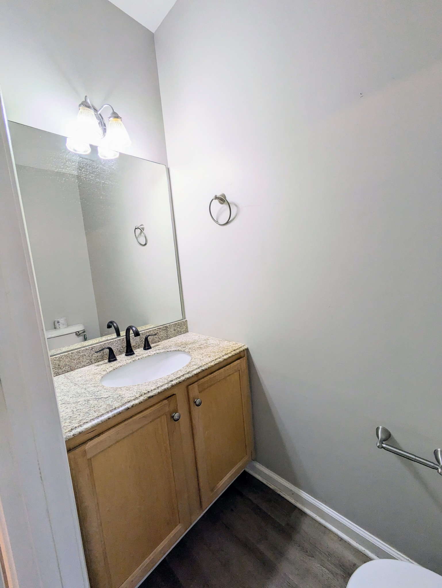 1101 Downs Boulevard, Unit B105 Franklin, TN 37064 - Photo 10 of 44 a bathroom with a sink vanity and mirror