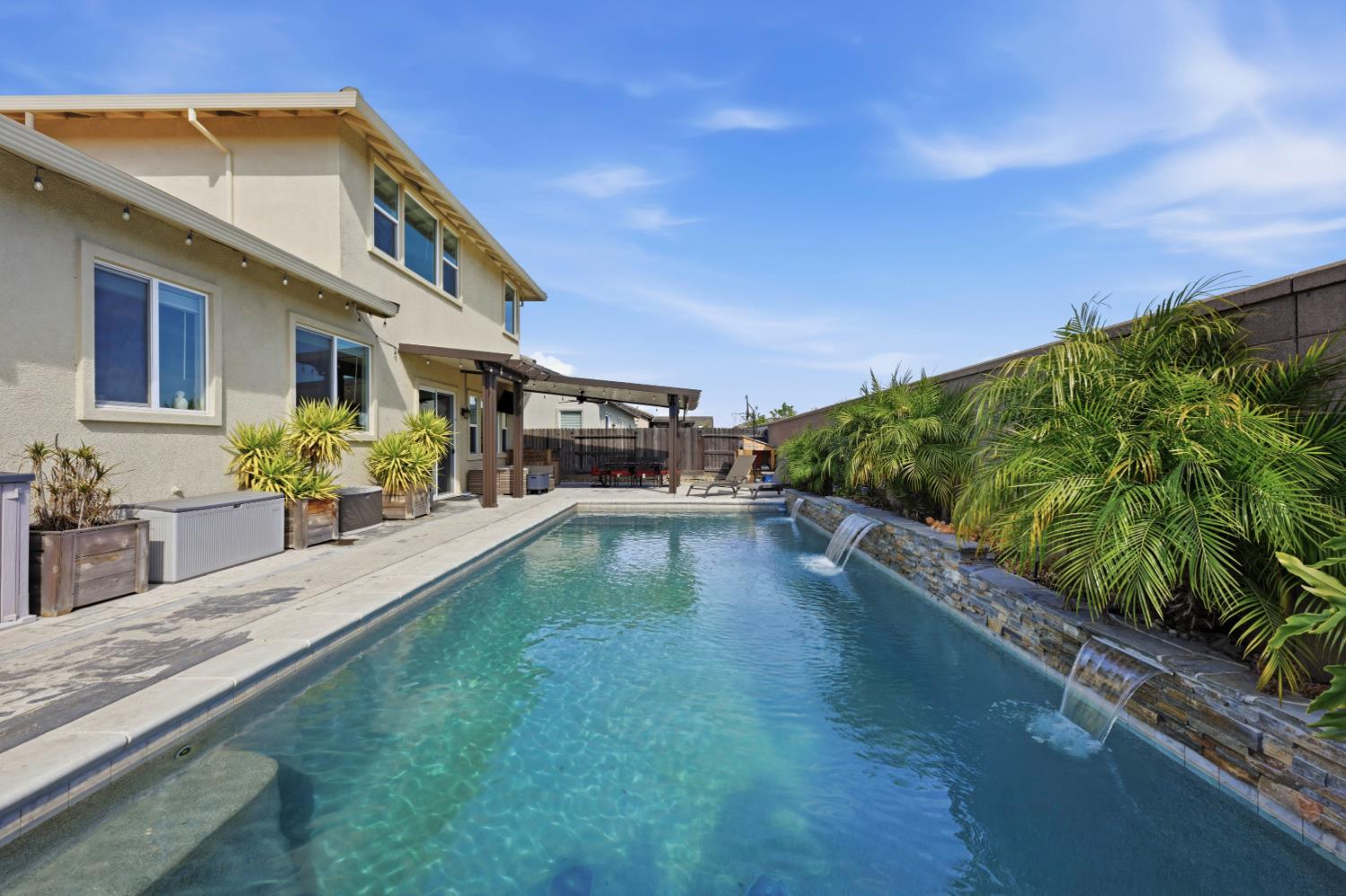 a view of a house with a swimming pool