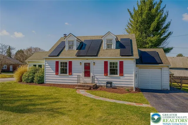 a front view of house with yard