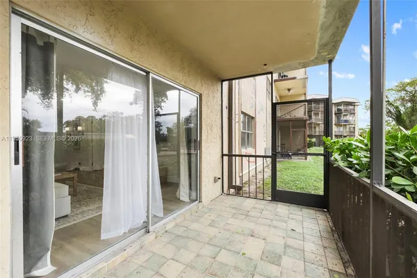a balcony view with outdoor shower