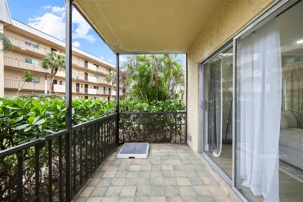 a house view with a outdoor space