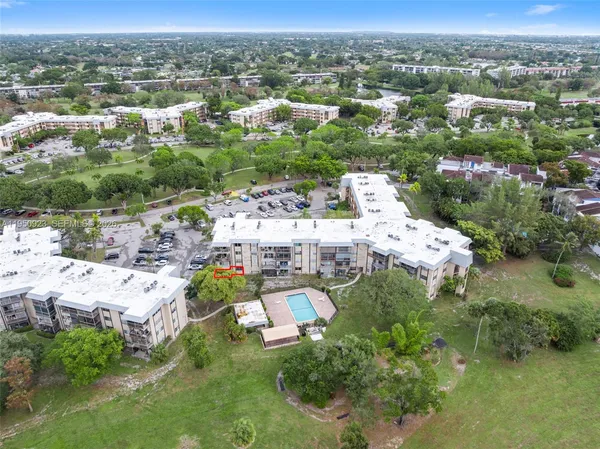 an aerial view of a house with a garden