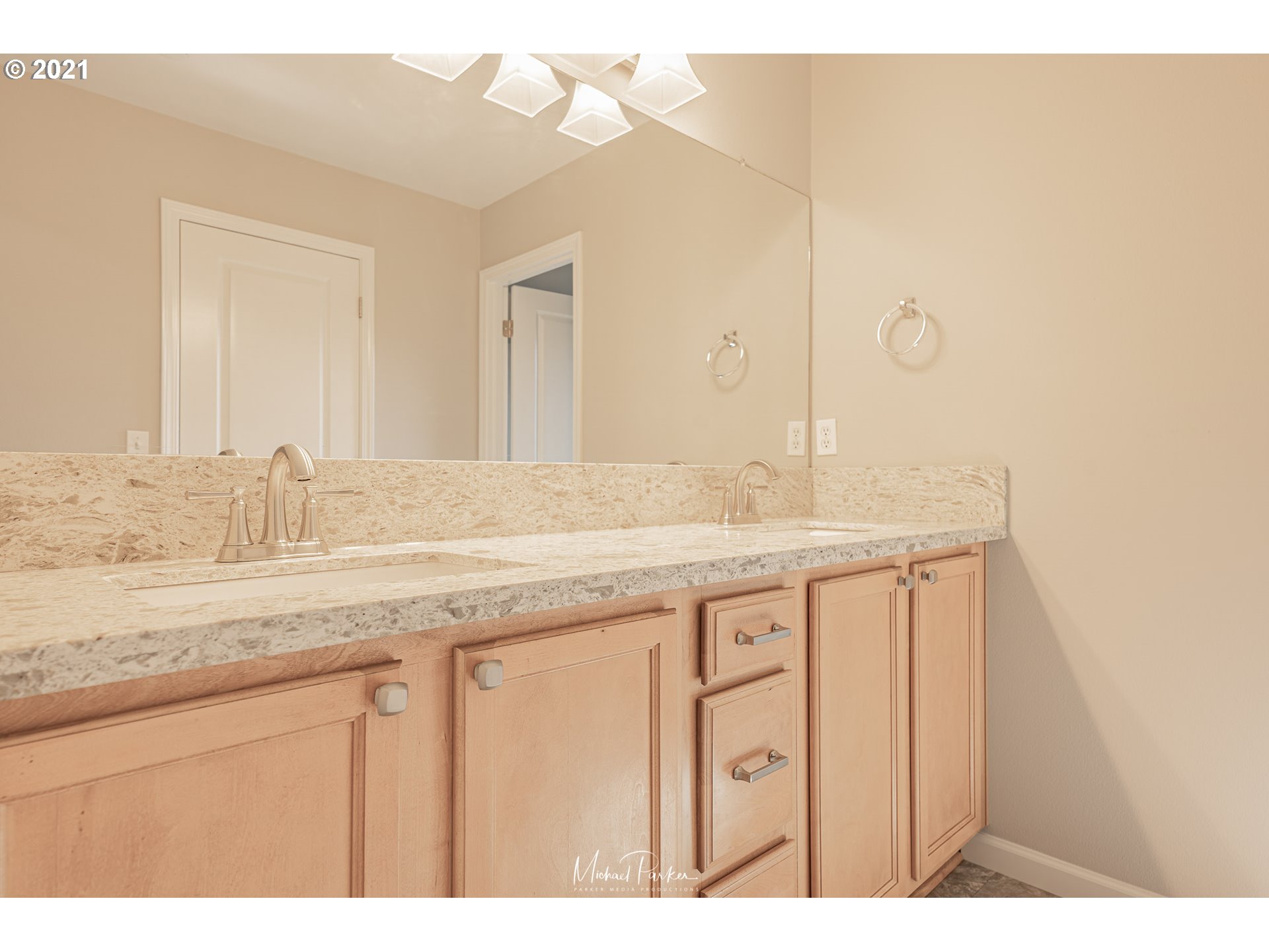 19947 Southwest Jette Lane Aloha, OR 97003 - Photo 18 of 26 a bathroom with a granite countertop sink and a mirror