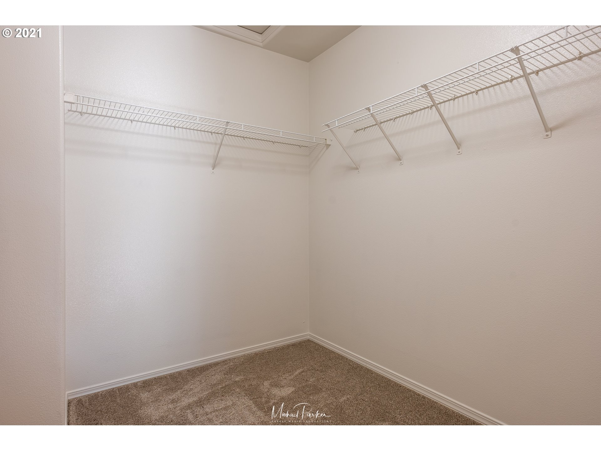 19947 Southwest Jette Lane Aloha, OR 97003 - Photo 20 of 26 a view of a room with racks on the wall