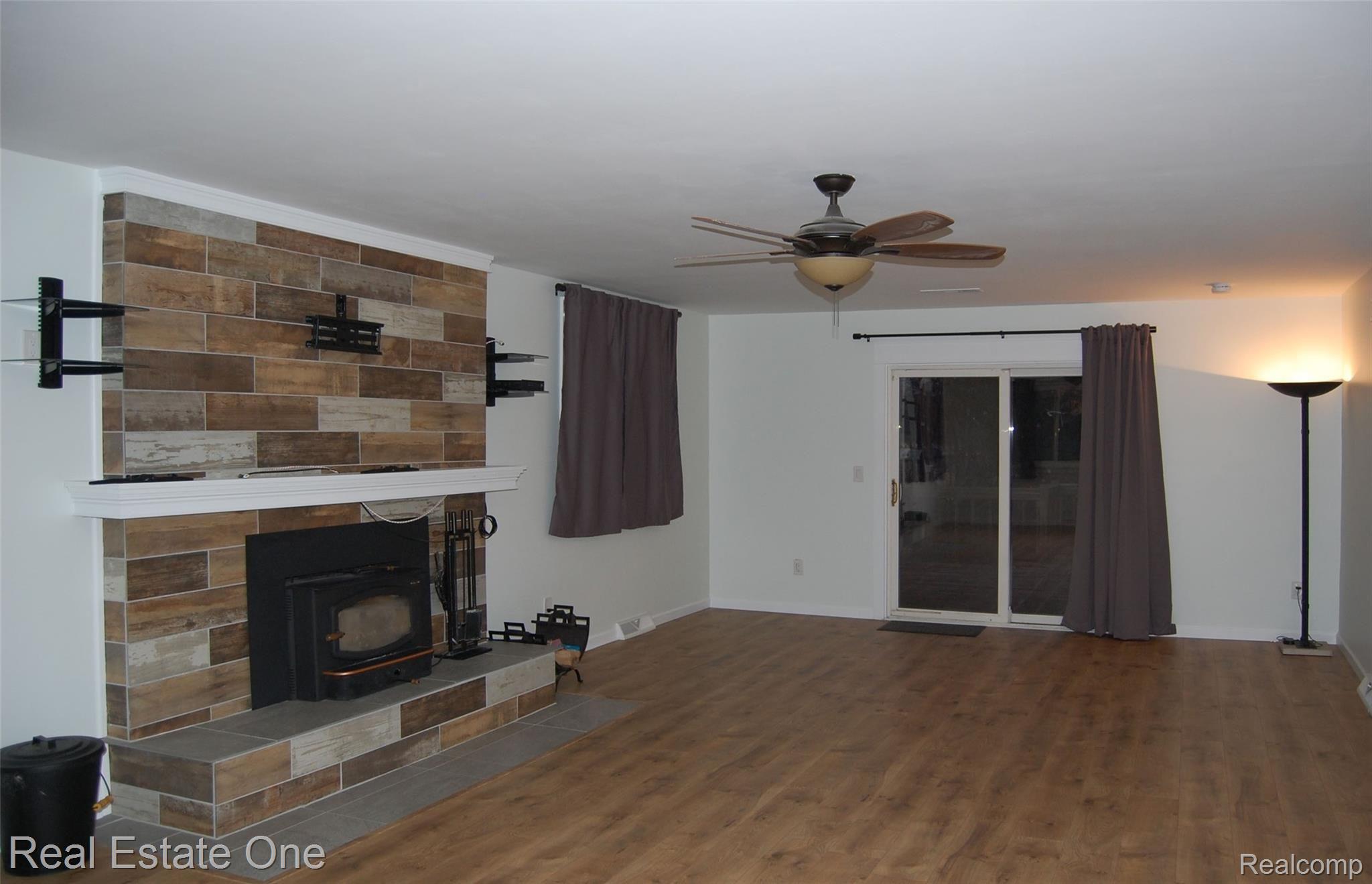 12975 15 Mile Road Sterling Heights, MI 48312 - Photo 7 of 26 Living Room with FP.jpg