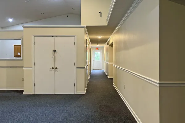 a view of hallway with stairs