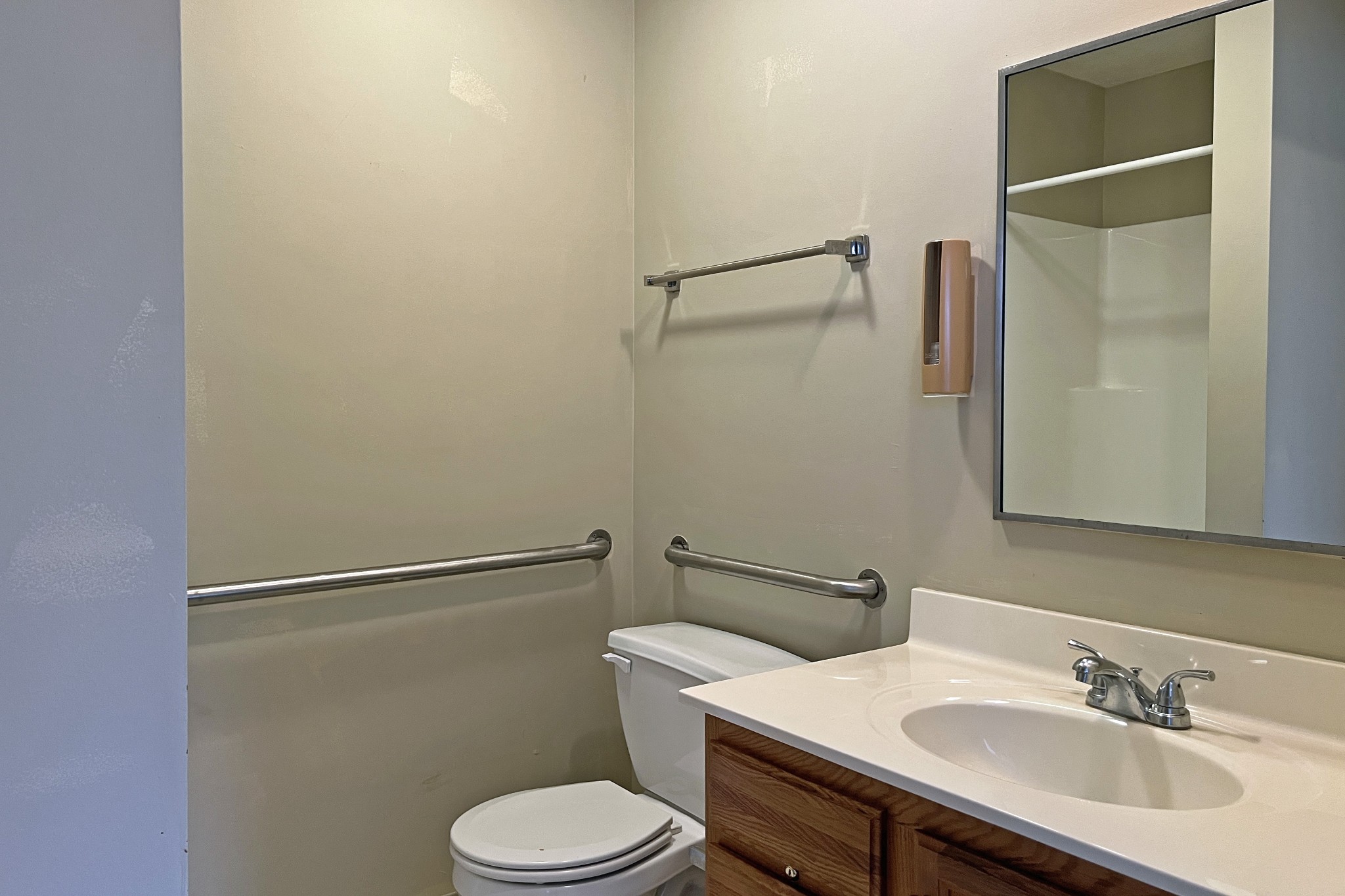 1117 Brookhaven Road Franklin, KY 42134 - Photo 16 of 42 a bathroom with a sink toilet and a mirror
