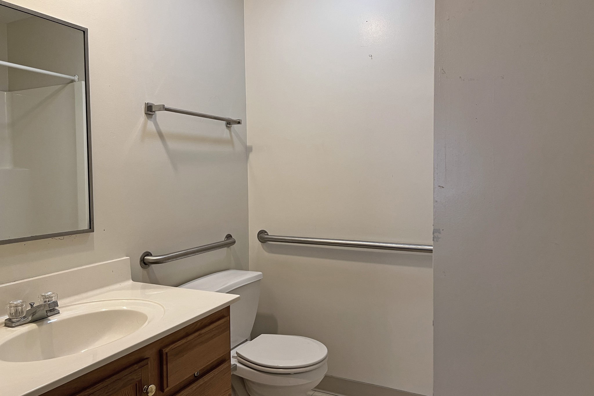 1117 Brookhaven Road Franklin, KY 42134 - Photo 18 of 42 a bathroom with a sink a toilet and mirror