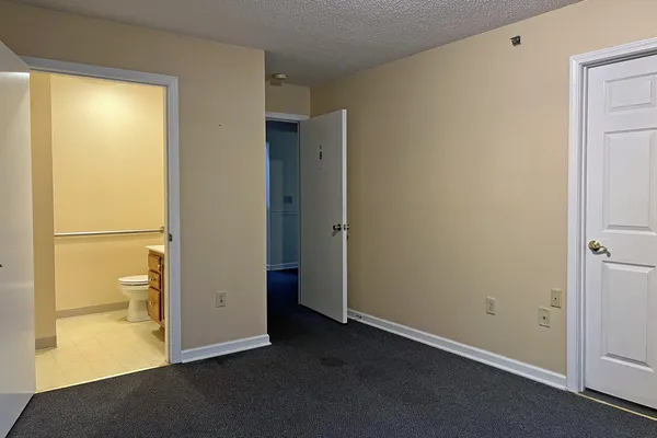 a view of a bathroom with a glass door