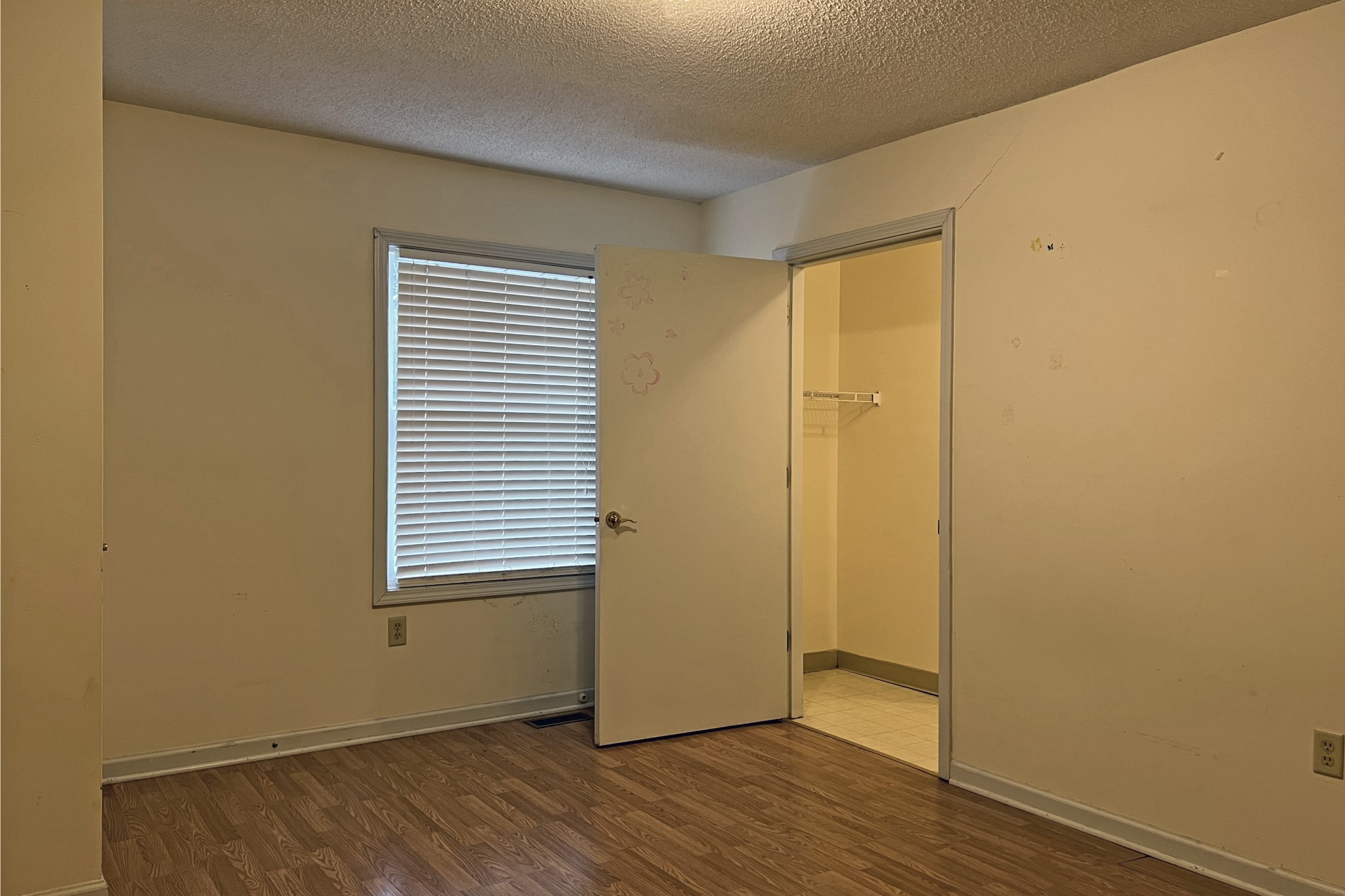 1117 Brookhaven Road Franklin, KY 42134 - Photo 38 of 42 a view of an empty room with wooden floor and a window