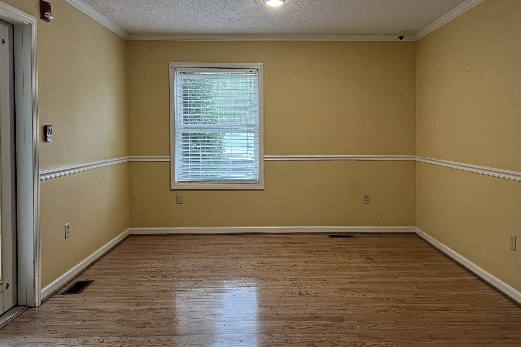 1117 Brookhaven Road Franklin, KY 42134 - Photo 6 of 42 a view of a room with wooden floor and windows